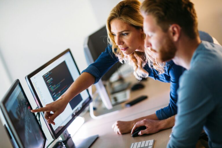 Software engineers working on project and programming in company Software engineers working on project and programming in company
