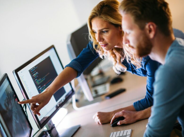 Software engineers working on project and programming in company Software engineers working on project and programming in company